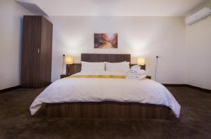 Voodi või voodid majutusasutuse Sinclair Guest House toas