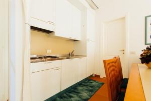 A kitchen or kitchenette at Residence Renaione