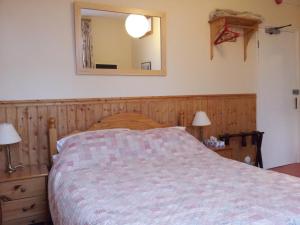 Postel nebo postele na pokoji v ubytování Acorn Guest House