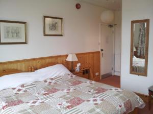 Postel nebo postele na pokoji v ubytování Acorn Guest House