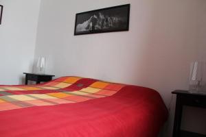 Postel nebo postele na pokoji v ubytování Maison Perron CIR- VDA-LATHUILE-N0062