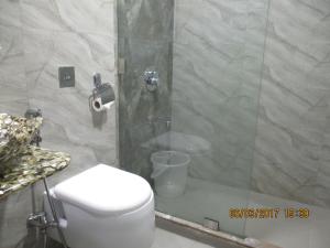 Koupelna v ubytování Hotel Sapna