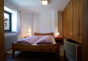 Postel nebo postele na pokoji v ubytování Hotel Garni Gonzaga