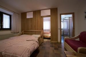 Postel nebo postele na pokoji v ubytování Hotel Garni Gonzaga + 37 fotografií