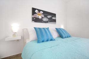 Postel nebo postele na pokoji v ubytování Apartments Nada