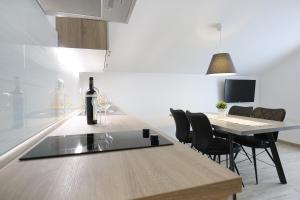 Kuchyň nebo kuchyňský kout v ubytování Apartments Nada