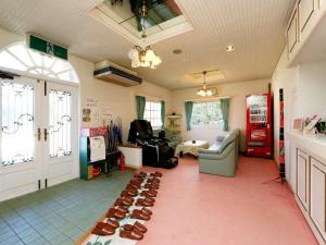 Χώρος καθιστικού στο ペンション百万本のバラ "A Million Roses"