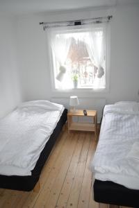 Cama o camas de una habitación en Berggårdens Gästgiveri