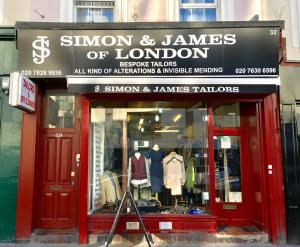 a store front with a sign for the sunion and james of london at London Residence in London