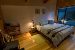 Voodi või voodid majutusasutuse Lodge BordeBaker toas