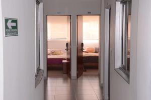 Hotel Manhattan Barbosa客房内的一张或多张床位