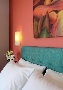 Ένα ή περισσότερα κρεβάτια σε δωμάτιο στο Amaryllis Hotel Apartments