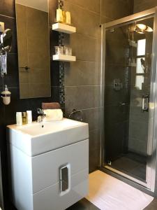 Kúpeľňa v ubytovaní Hotel Villa Völgy Wellness & Konferencia