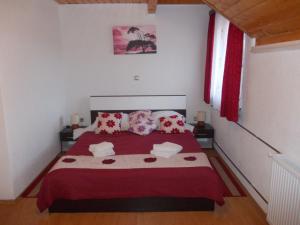 Postel nebo postele na pokoji v ubytování Apartments Pavlić