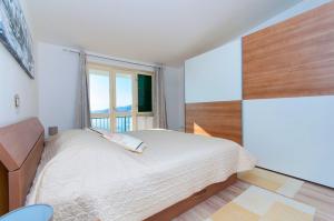 Posteľ alebo postele v izbe v ubytovaní Apartment Lelas