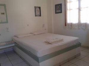 Posteľ alebo postele v izbe v ubytovaní CretanHouse