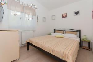 Posteľ alebo postele v izbe v ubytovaní Apartment Lelas
