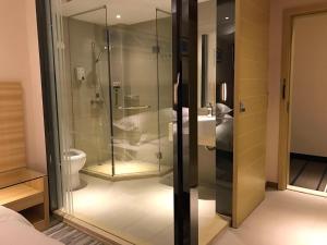 Baðherbergi á Hotel Pomelo Premier 西柚臻选武昌站酒店
