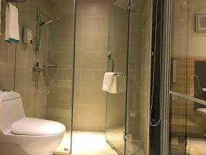 Koupelna v ubytování Hotel Pomelo Premier 西柚臻选武昌站酒店