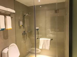 Koupelna v ubytování Hotel Pomelo Premier 西柚臻选武昌站酒店