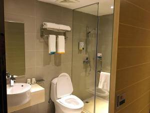 Baðherbergi á Hotel Pomelo Premier 西柚臻选武昌站酒店