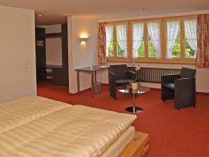 Postel nebo postele na pokoji v ubytování Hotel Steinbock