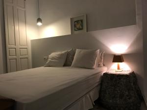 Postel nebo postele na pokoji v ubytování Casa Bolsa43