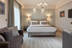 Voodi või voodid majutusasutuse Ava Hotel and Suites toas