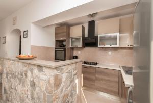 Kuchyňa alebo kuchynka v ubytovaní Apartment Lelas