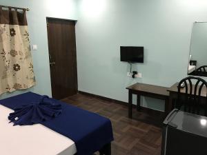 TV a/nebo společenská místnost v ubytování Leisure Cottages
