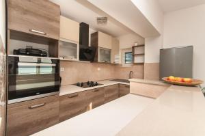 Kuchyňa alebo kuchynka v ubytovaní Apartment Lelas