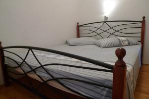 Posteľ alebo postele v izbe v ubytovaní Apartment Chupa