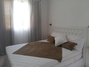 Ένα ή περισσότερα κρεβάτια σε δωμάτιο στο Habana Beach Flat