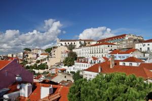 a city with white buildings and red roofs at Duplex Lisbon Castle Sao Jorge in Lisbon