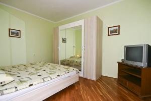 Katil atau katil-katil dalam bilik di Apartment Casa Robi