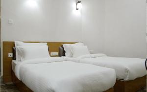 Postel nebo postele na pokoji v ubytování Twin Spring