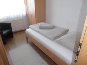 Posteľ alebo postele v izbe v ubytovaní Schottar FeWo ST 09