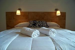 Posteľ alebo postele v izbe v ubytovaní Hostal Martinval