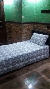 Voodi või voodid majutusasutuse Affordable Baguio APT toas