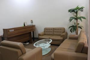 Ein Sitzbereich in der Unterkunft Morse Guesthouse Syariah