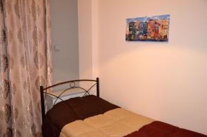 Posteľ alebo postele v izbe v ubytovaní Kalimera Apartment