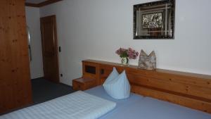 Postel nebo postele na pokoji v ubytování Hotel Hubertus