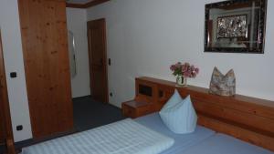 Postel nebo postele na pokoji v ubytování Hotel Hubertus