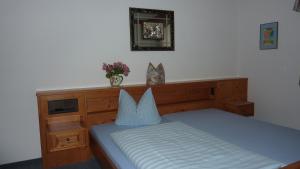 Postel nebo postele na pokoji v ubytování Hotel Hubertus
