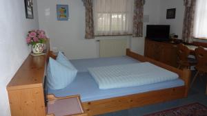 Postel nebo postele na pokoji v ubytování Hotel Hubertus
