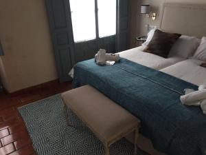 Posteľ alebo postele v izbe v ubytovaní Casa Boutique La Pila del Pato