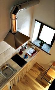 an overhead view of a kitchen with a sink and two windows at Sole Mio in Velletri