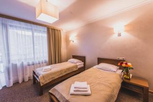 Postel nebo postele na pokoji v ubytování Davir Spa Resort + 34 fotografií