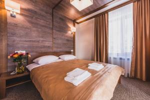 Katil atau katil-katil dalam bilik di Davir Spa Resort