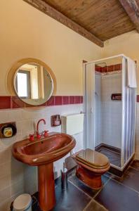 a bathroom with a sink and a toilet at B&B Vico Manenti in Modica